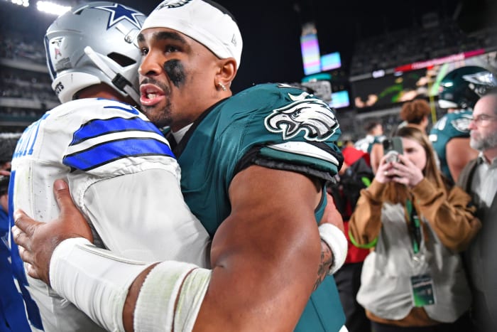 Dak Prescott (left) and Jalen Hurts (right) embrace after the Philadelphia Eagles defeated the Dallas Cowboys at Lincoln Financial Field in Week 9.